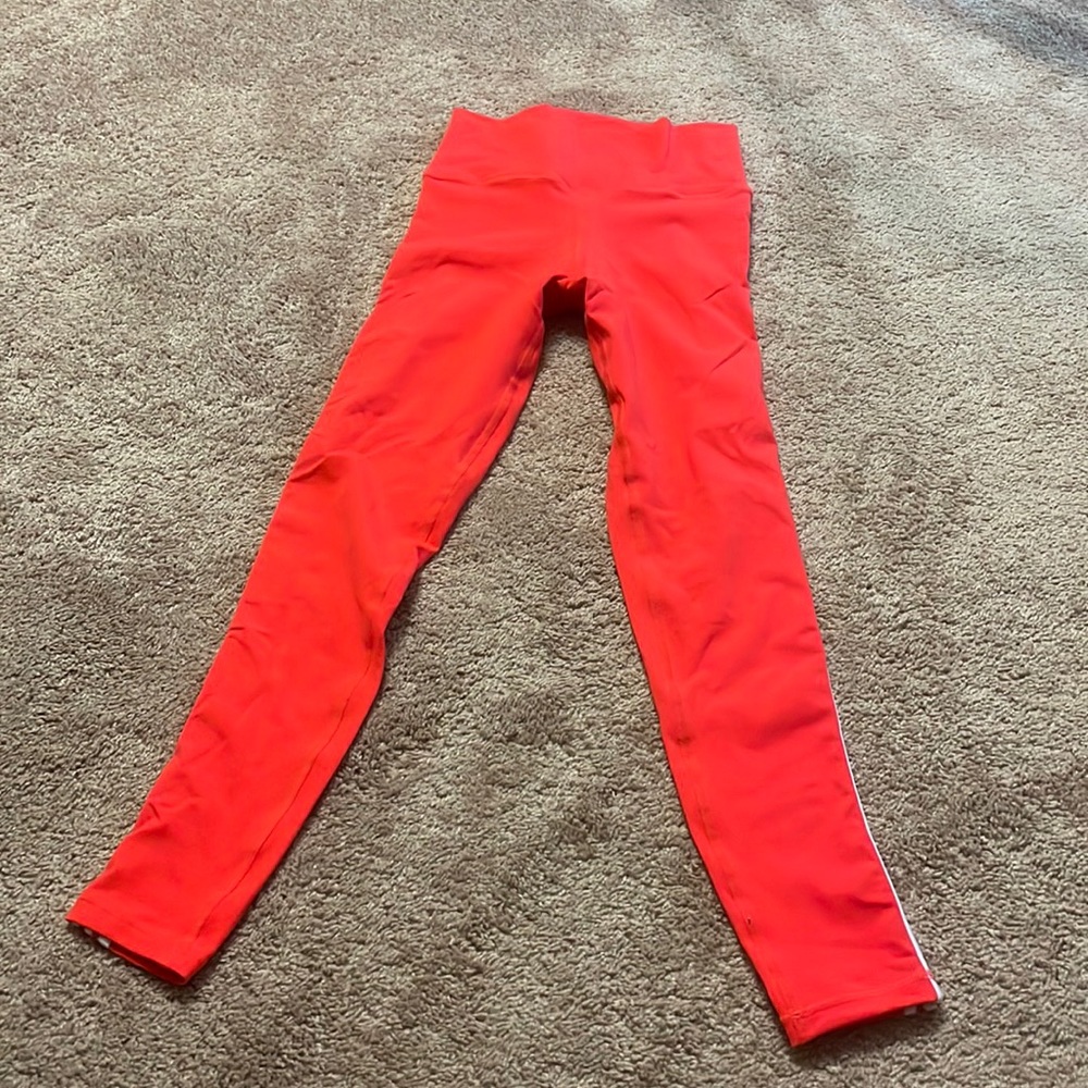 Red Women’s leggings full length with white sides size medium